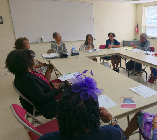 Rosa Rucker members in meeting